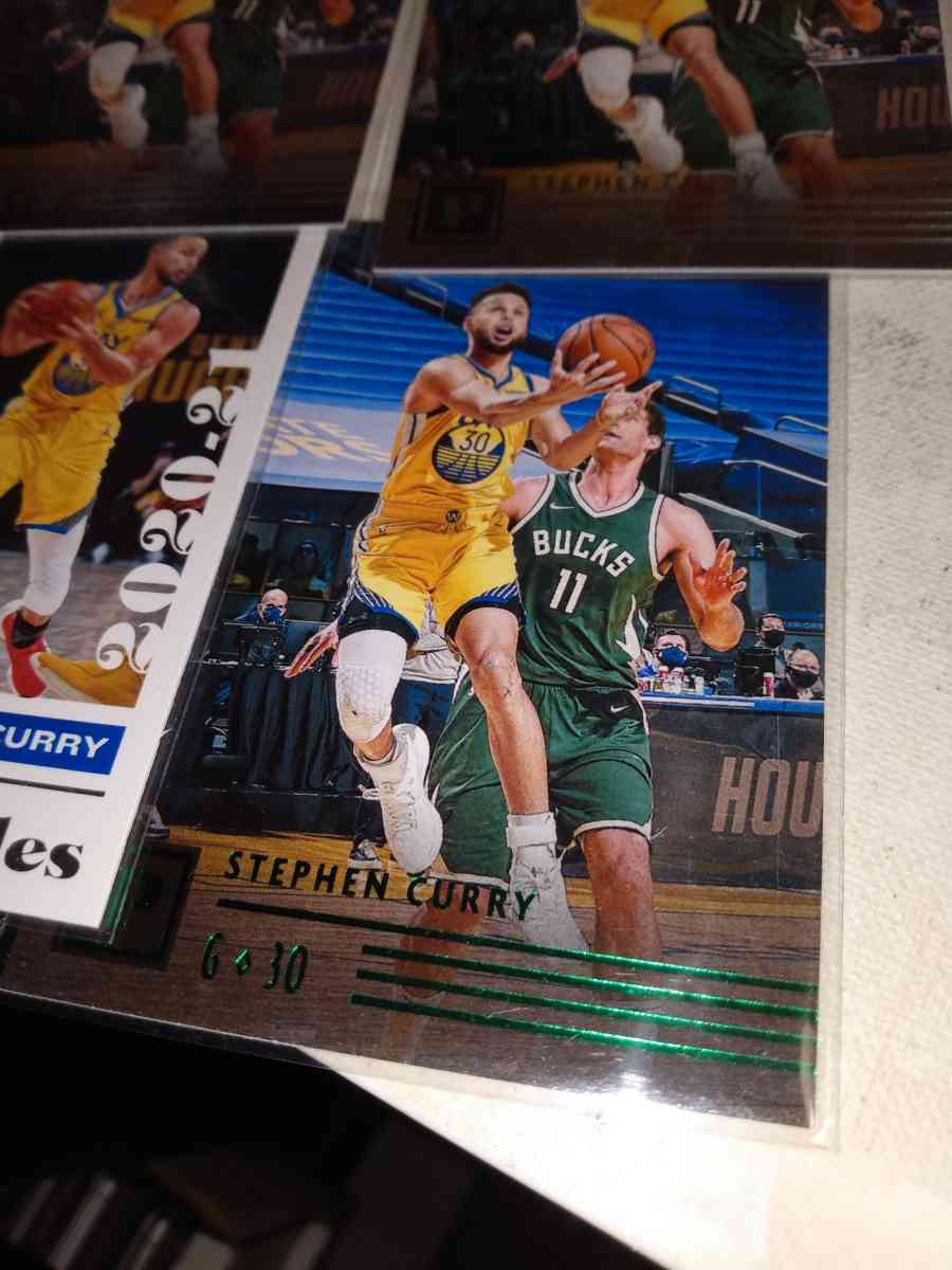 four card lot of Stephen Curry
