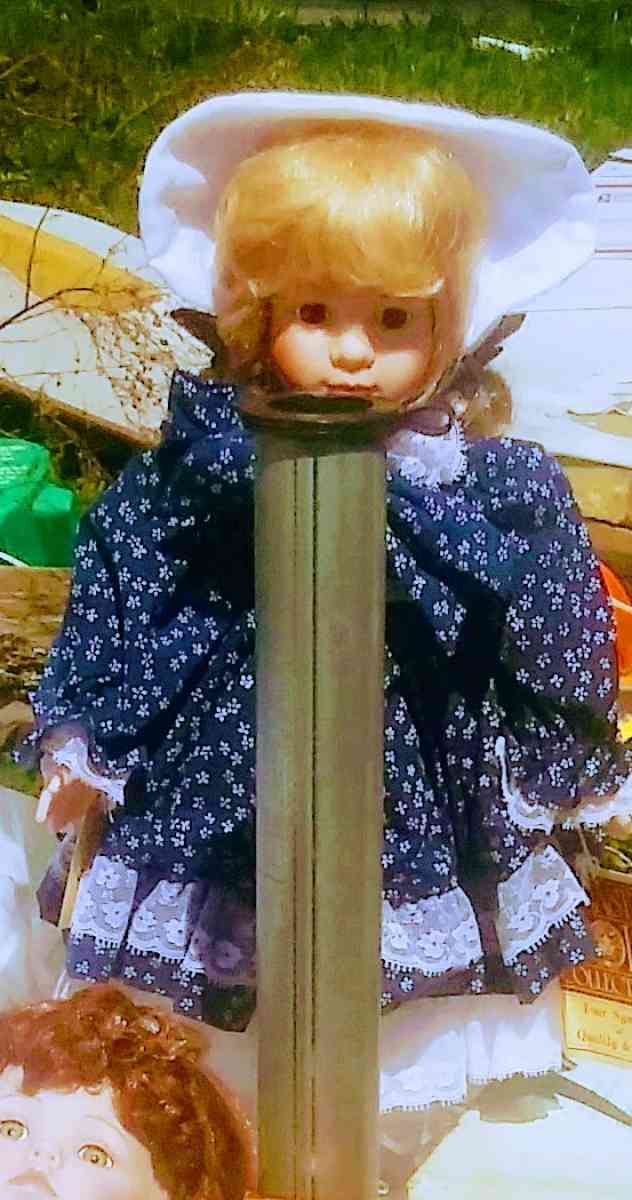 PORCEAIN DOLL with stand to display her