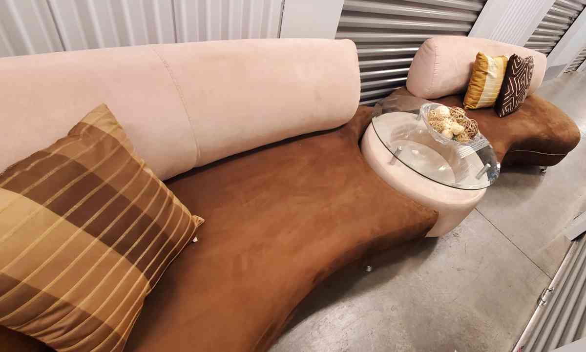 2 long curved sofas with matching table