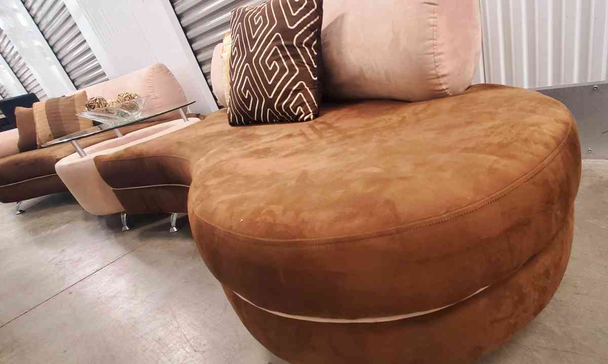 2 long curved sofas with matching table