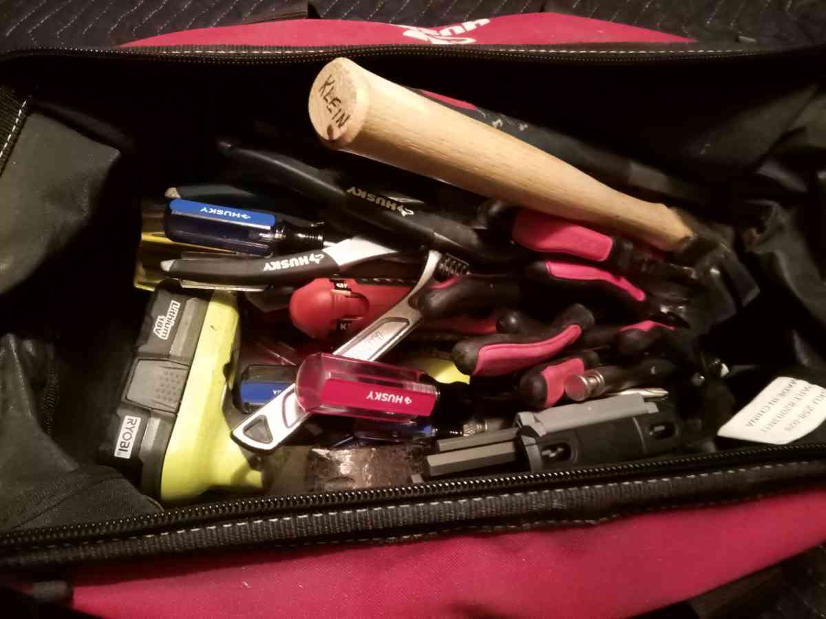 Husky tool bag with assorted tools