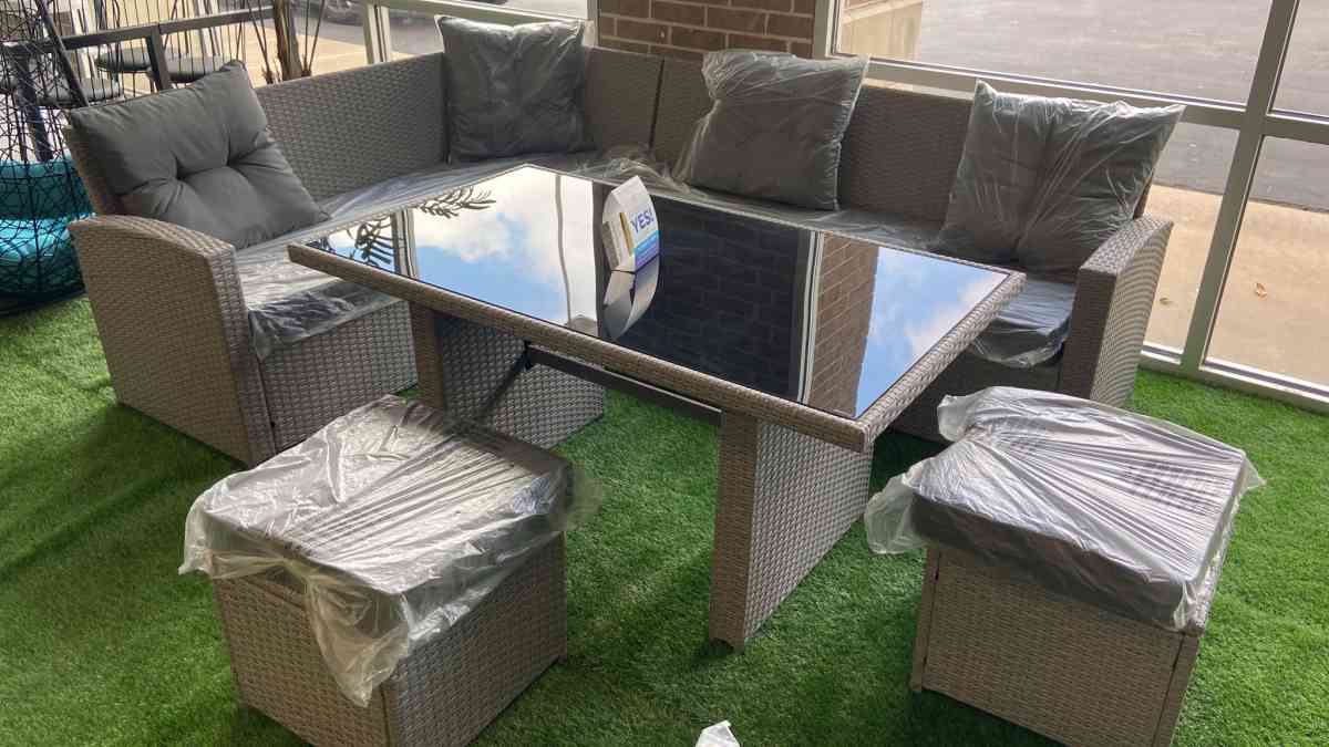 Patio sectional with gray cushions  we have delivery today 4