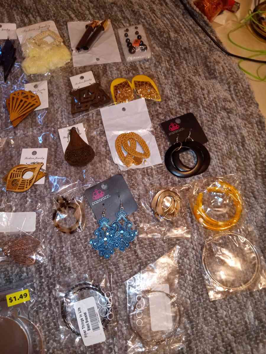 62 pairs of various brands of earrings they are all NIP