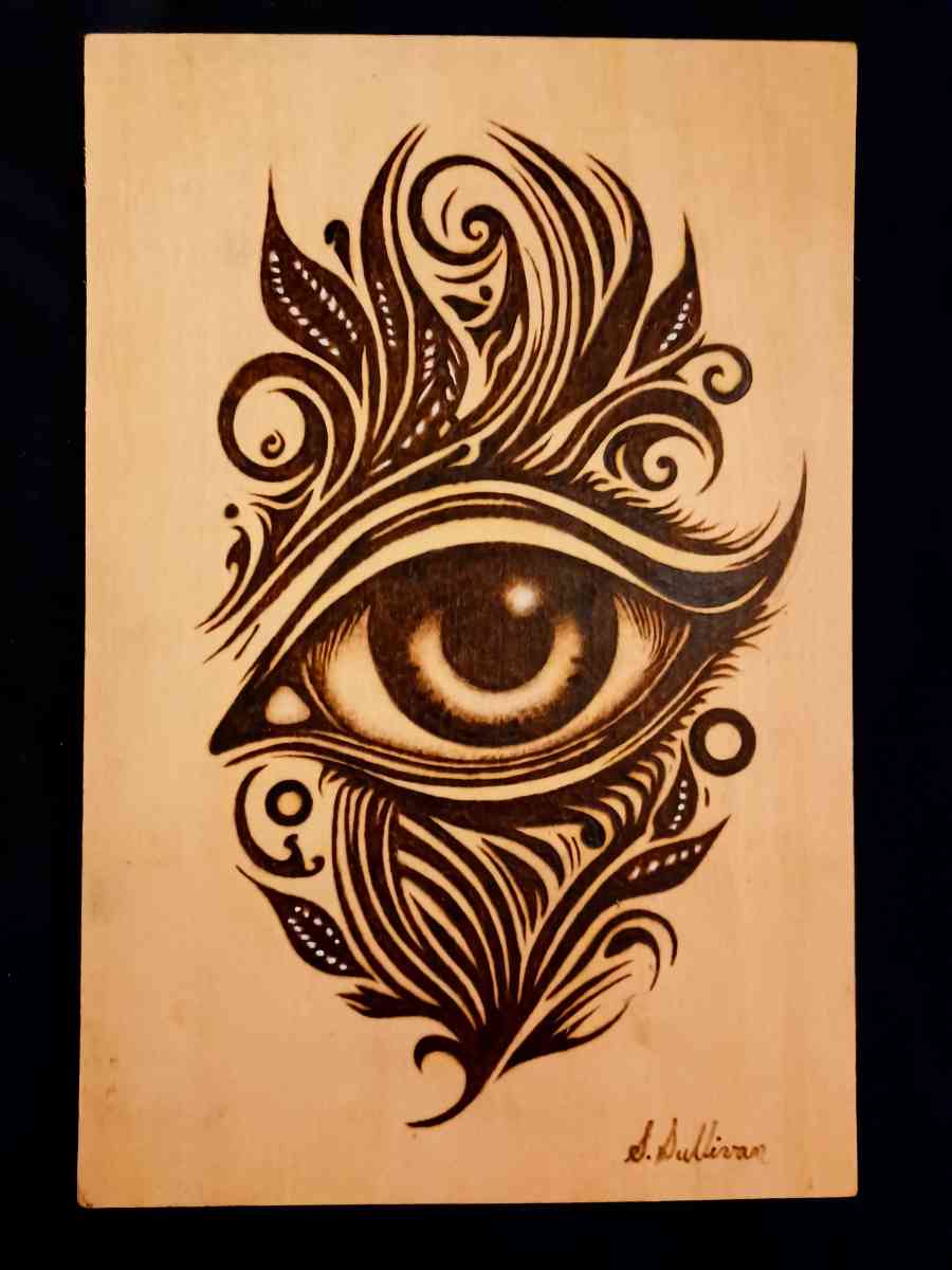 Portraits burned on wood