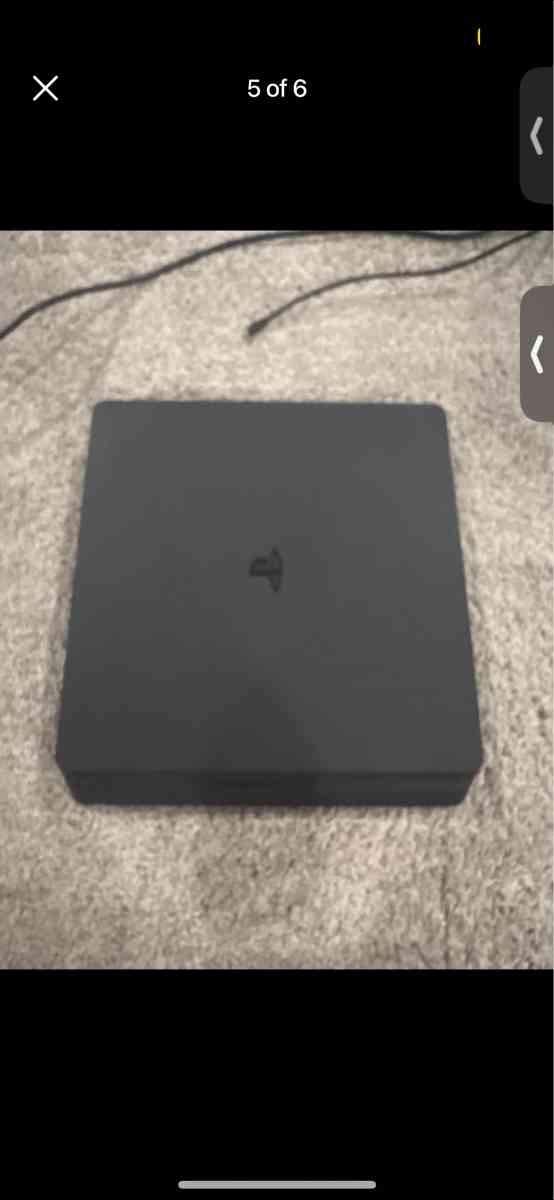 PlayStation 4 Slim 500 GB with blue controller and 5 games