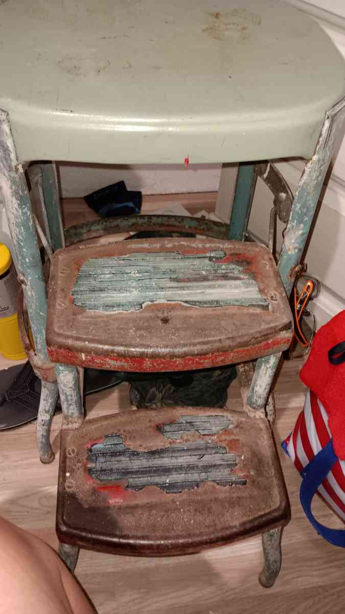 old metal step stool works good not sure who made it