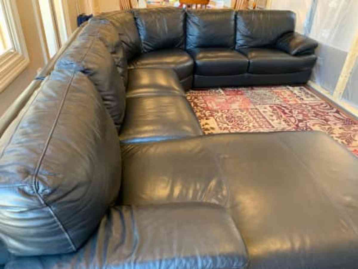Black leather sofa with chaise