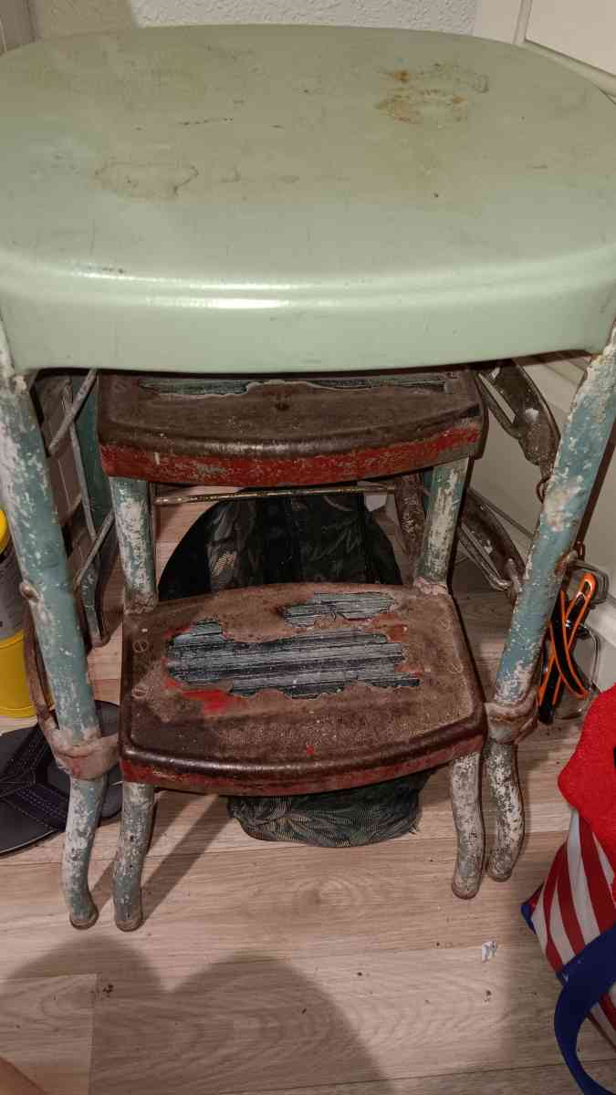 old metal step stool works good not sure who made it