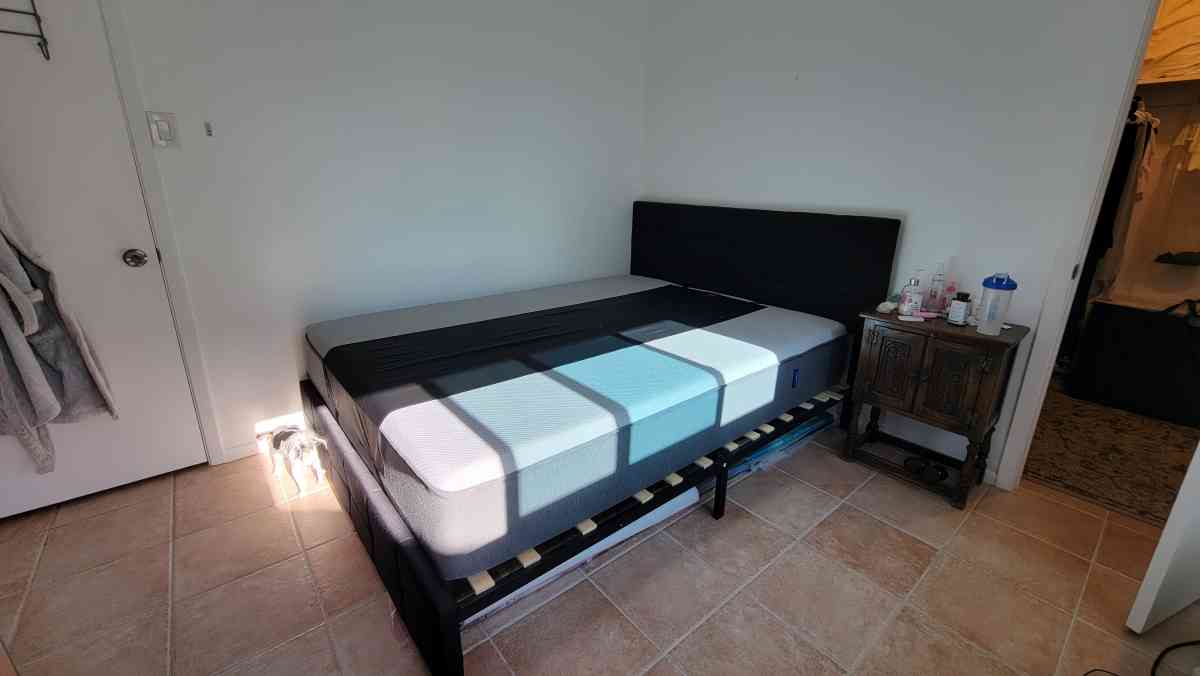 Queen memory foam mattress with a bed frame