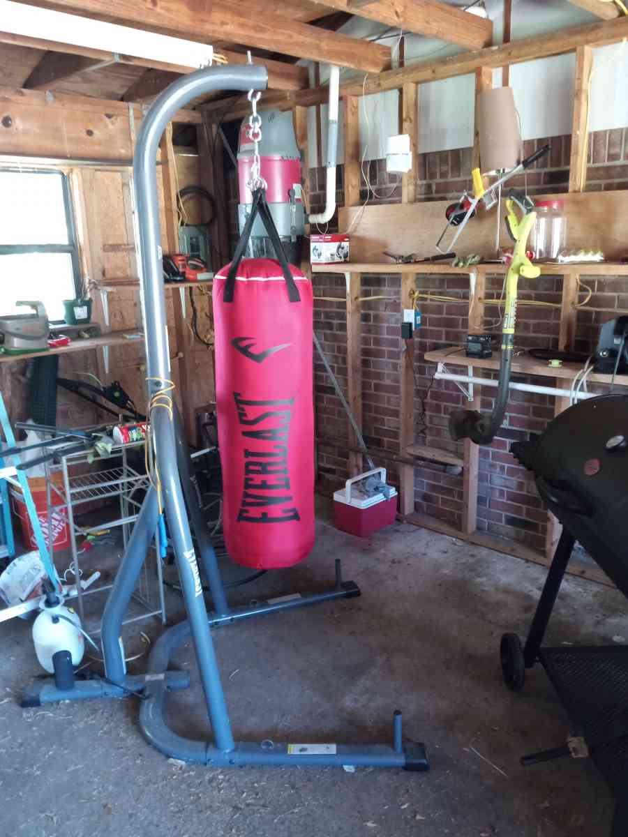 heavy punching bag and curl bar