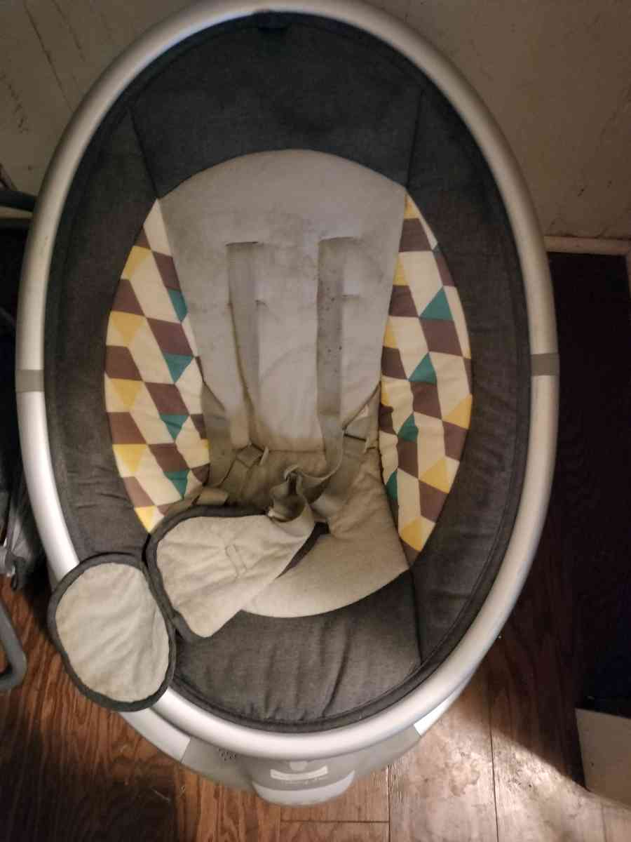 baby clothes chair and swing