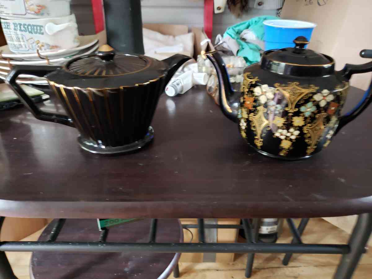 two novelty fancy teapots with lids together or separately