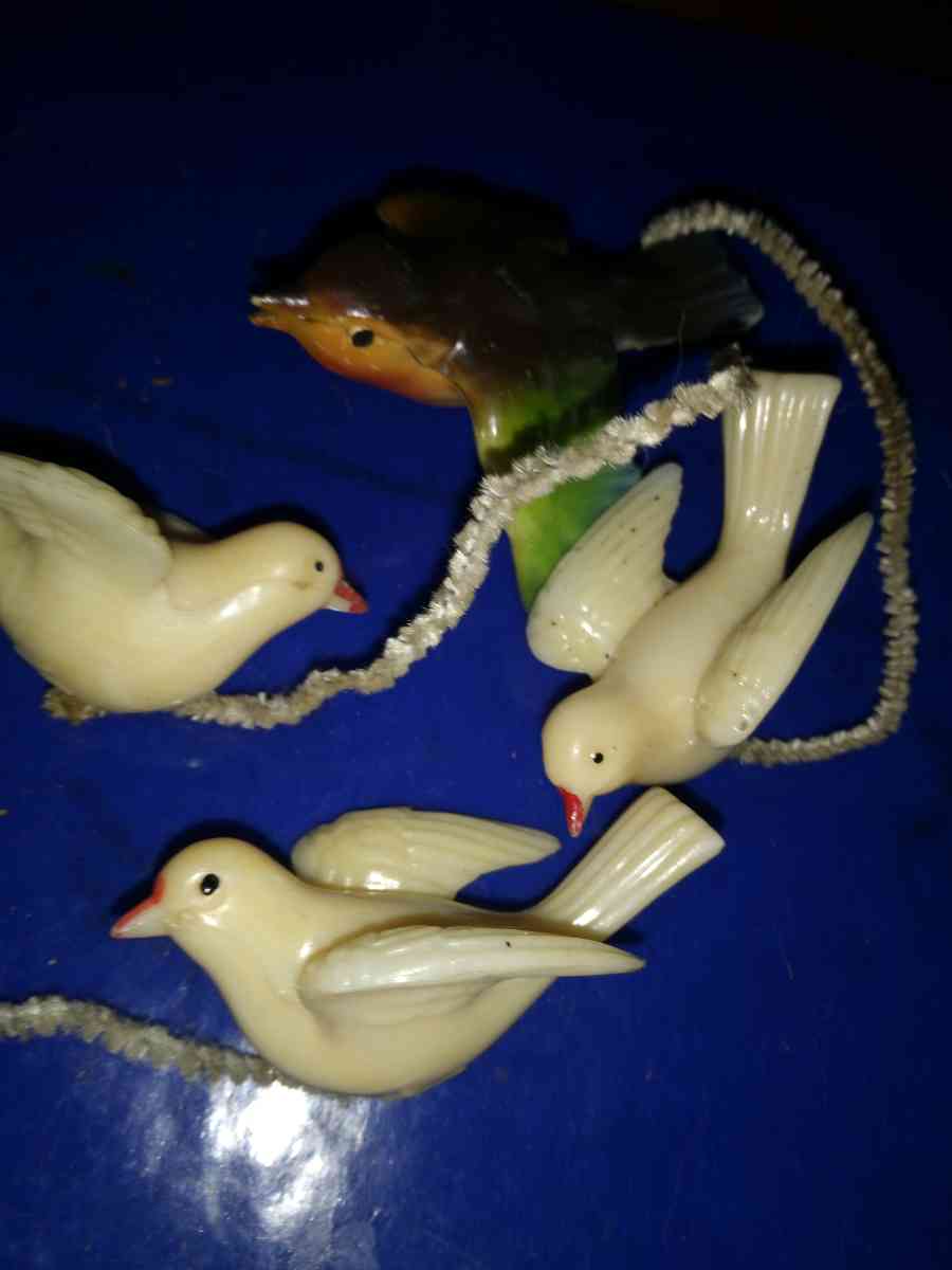 3 white and 1 airbrushed Lucite Birds