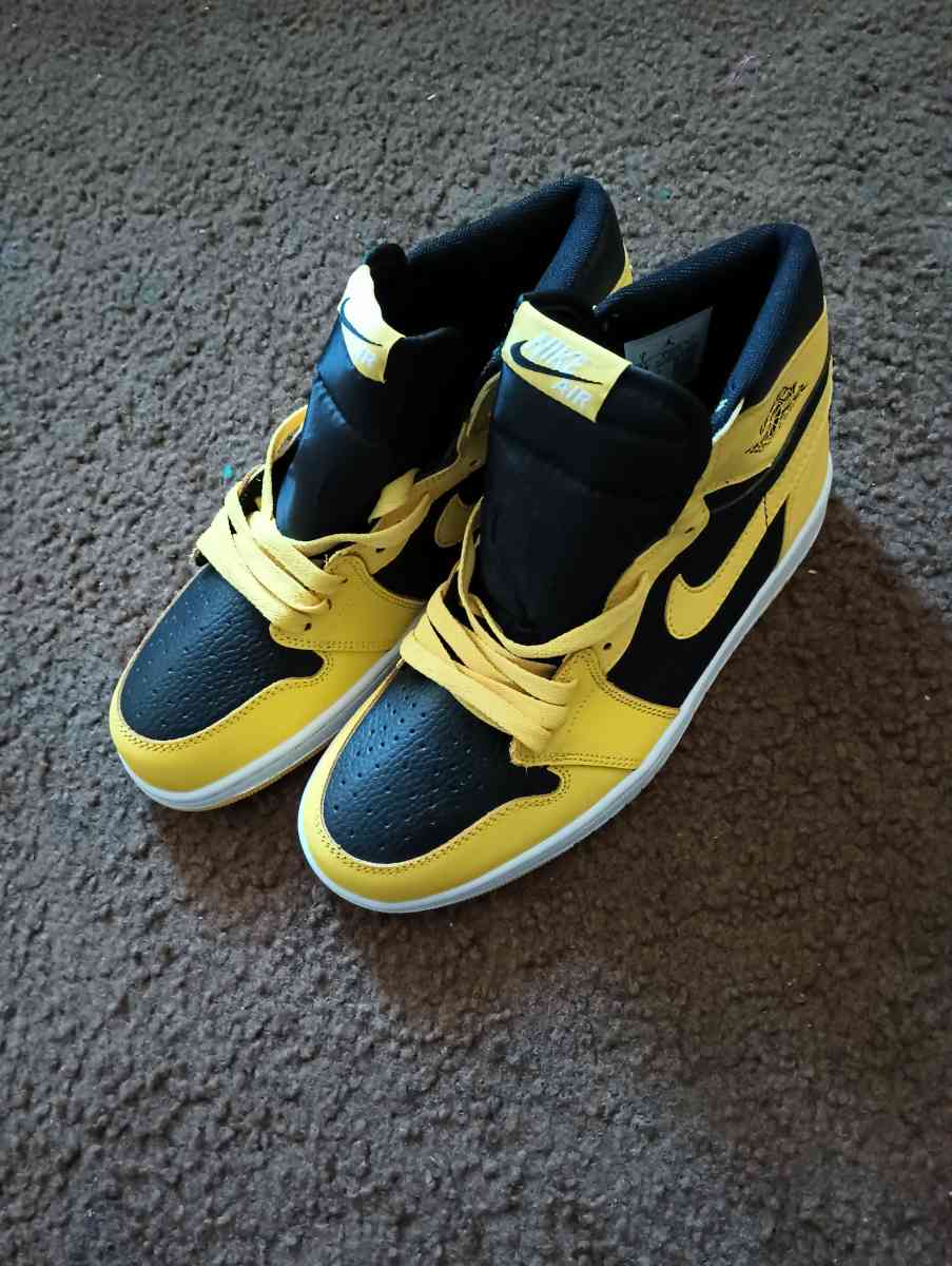 Nike Air Jordans yellow and black