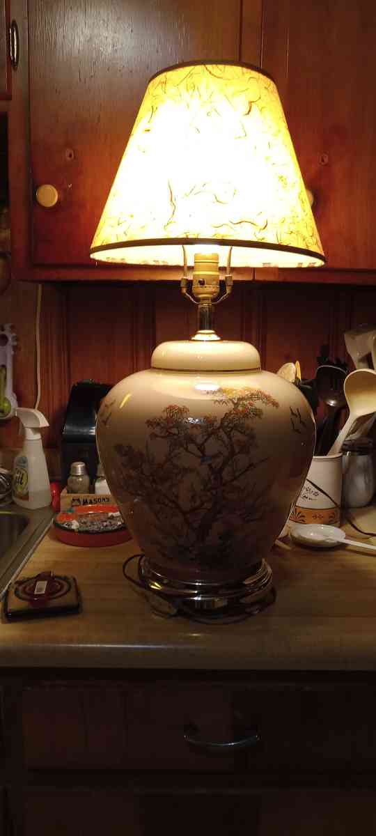 vintage decorative lamp with trees and birds on it