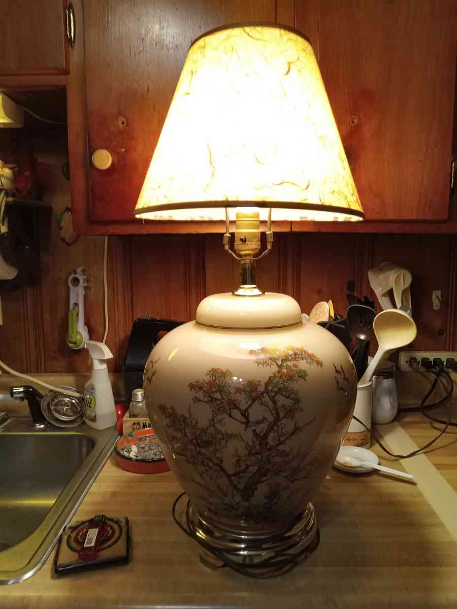 vintage decorative lamp with trees and birds on it