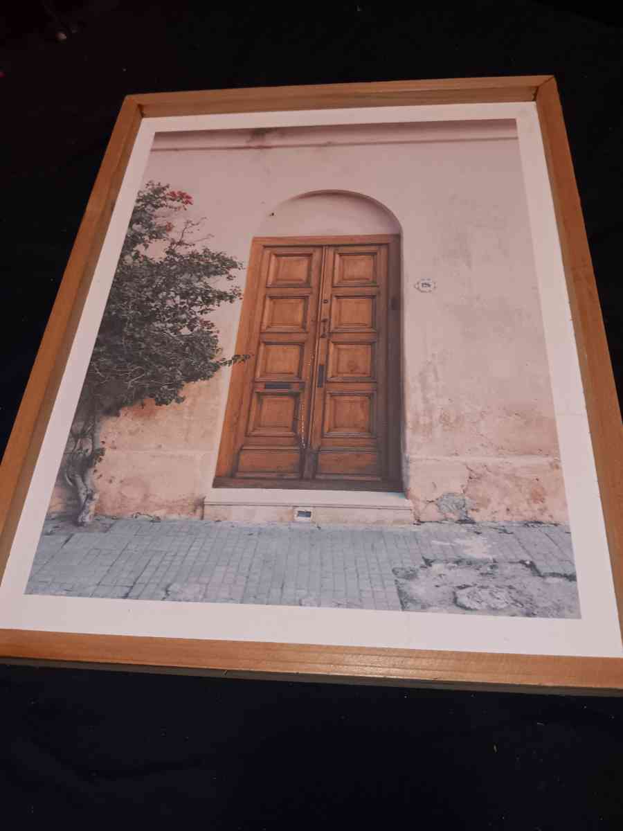 Wooden doorway framed painting