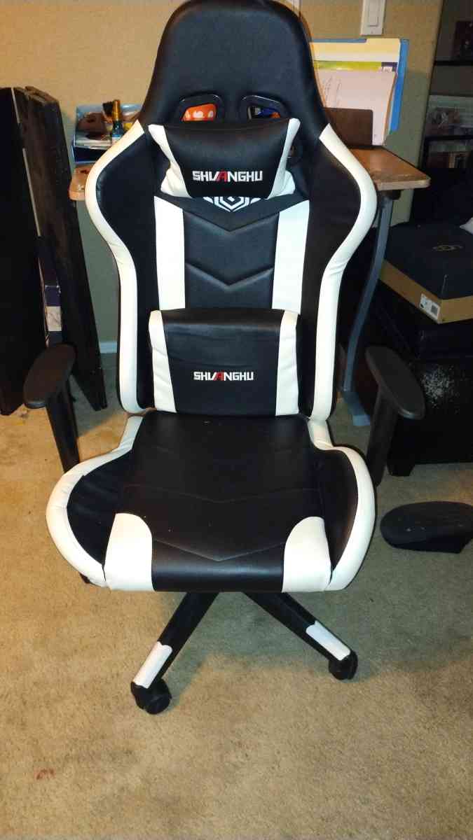 gaming chair and gaming steering wheel and pedals