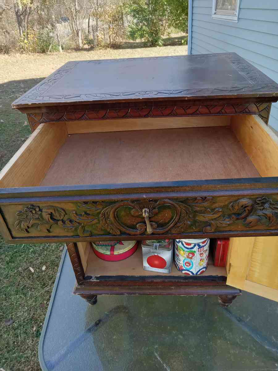 end table with storage ornate detailing
