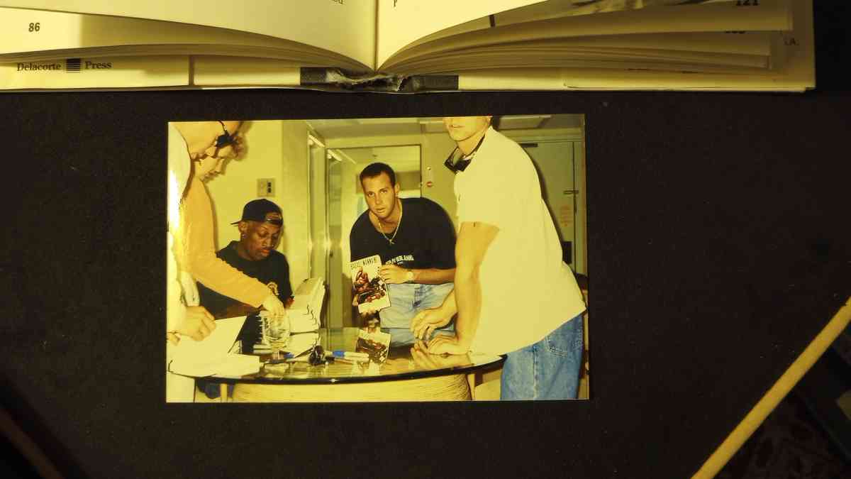 Autographed Signed with a picture of the book signing with C