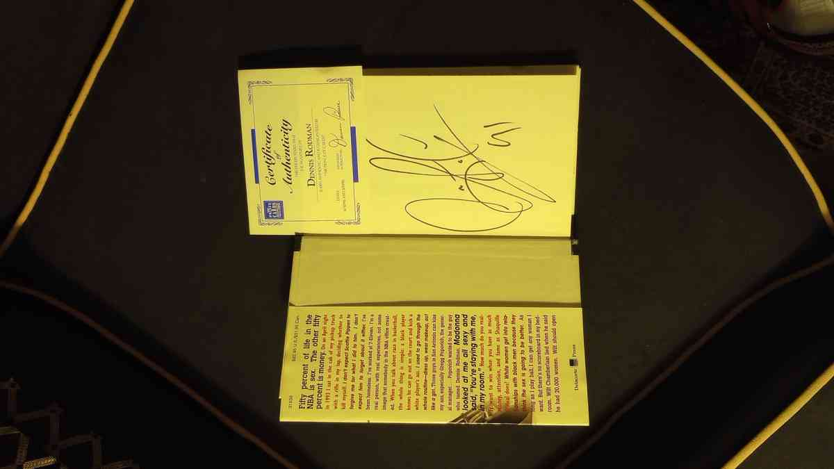 Autographed Signed with a picture of the book signing with C