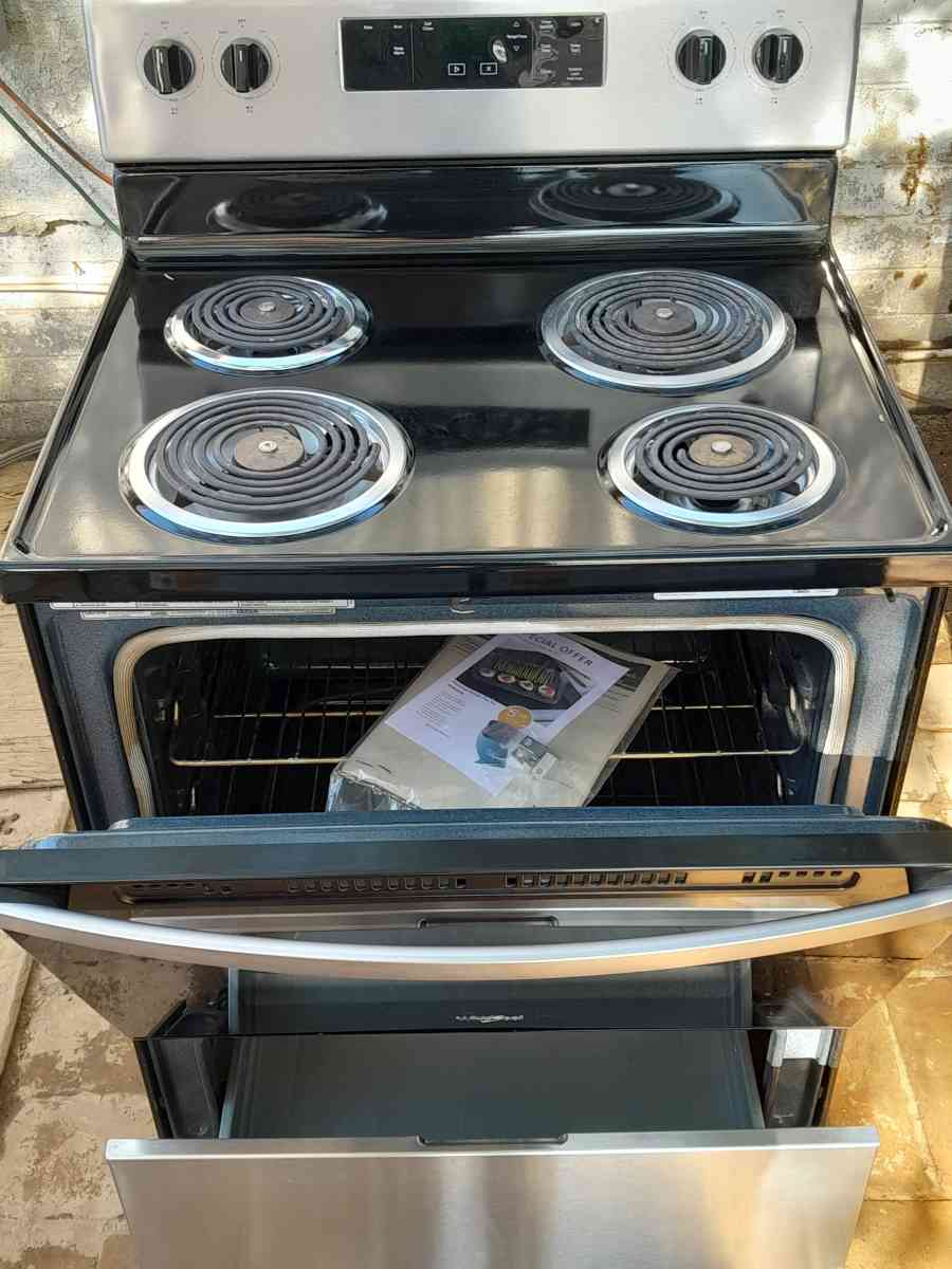 ELECTRIC WHIRLPOOL STOVE STENLESS STILL WITH BLACK EXCELLENT