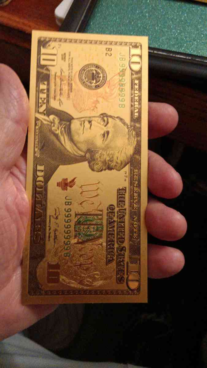 Set of Seven Commemorative Golden Bills covered with gold
