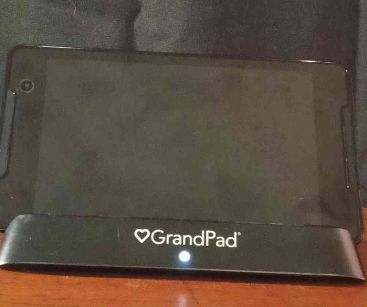 Grand pad tablet and cell phone with charging dock