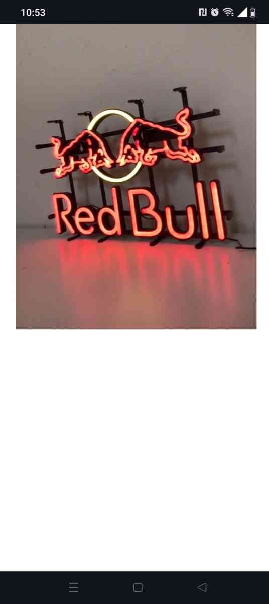 Red Bull refrigerator and neon Red Bull sign