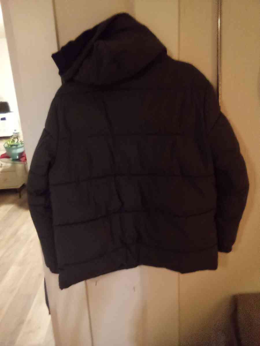 Kswiss coat with hood waterproof like new very worm and dry