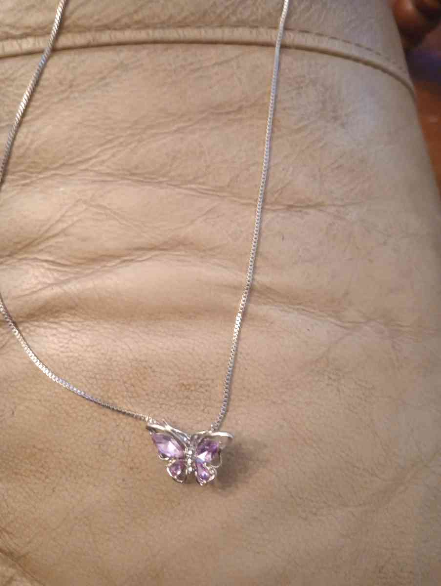 a butterfly necklace brand new