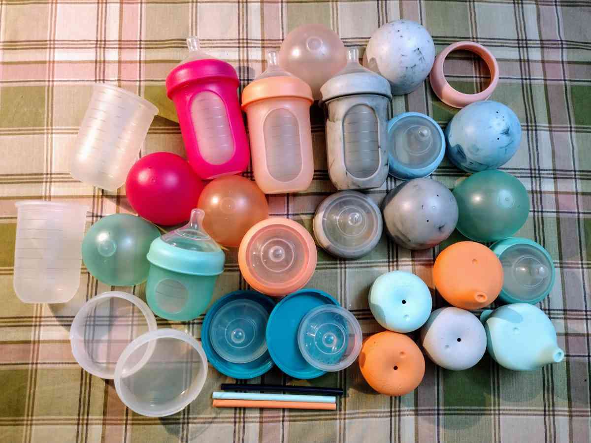Interchangeable Boon Nursh baby bottles and sippy cup access