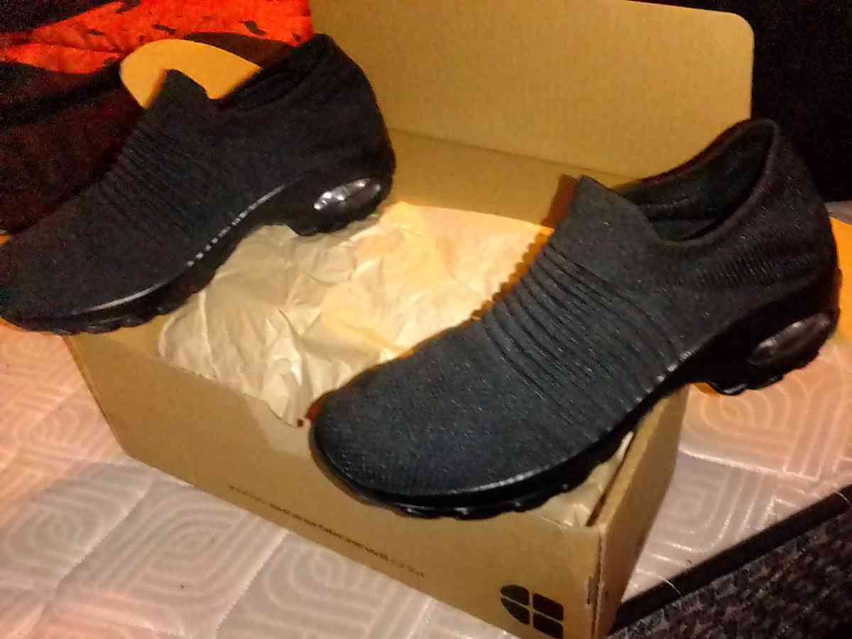 brand New womans  black slip on shoes size 9