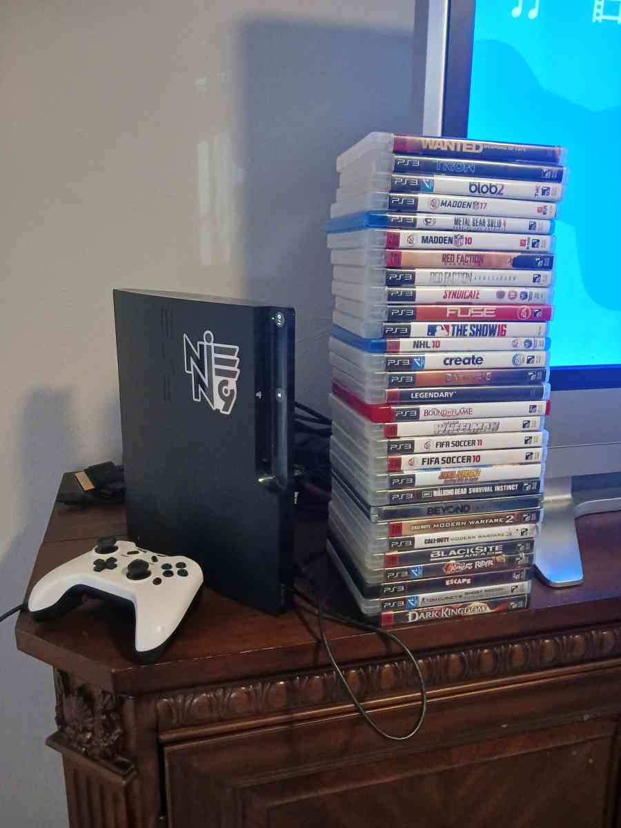 Ps3 slim console and 30 games