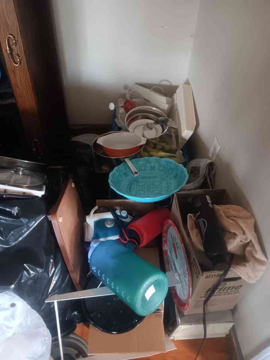 a large assortment of cookware bakeware and dishes