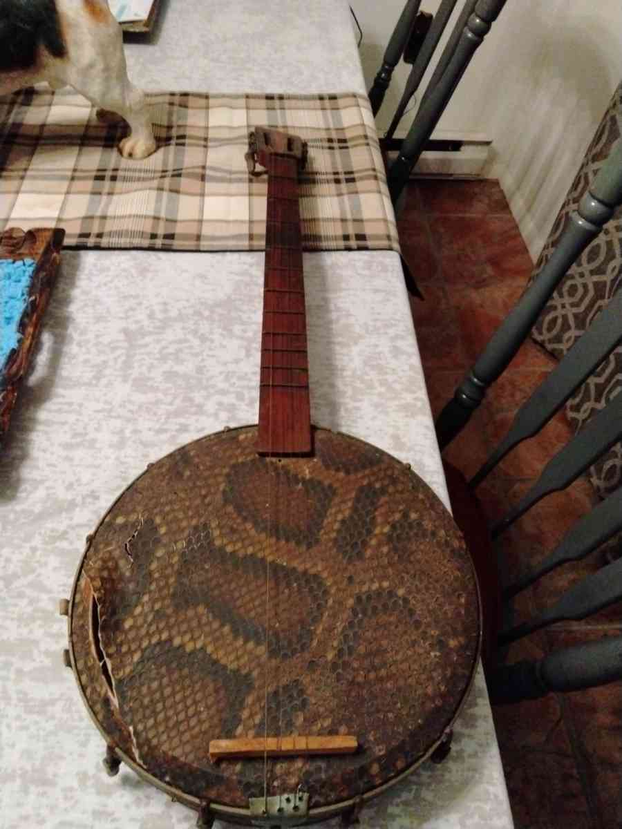 old Chinese banjo needs mending