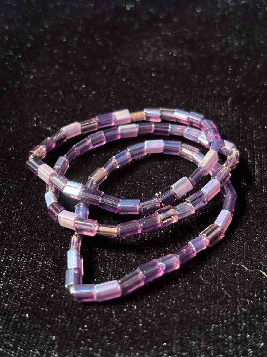 set of 3 handmade elastic purple beaded bracelets