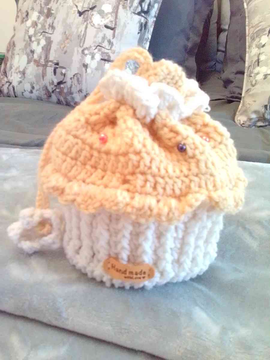 crocheted yellow cupcake pouch