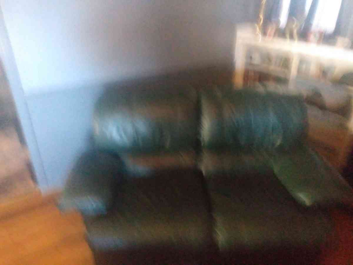 leather recliner on both sides very good condition