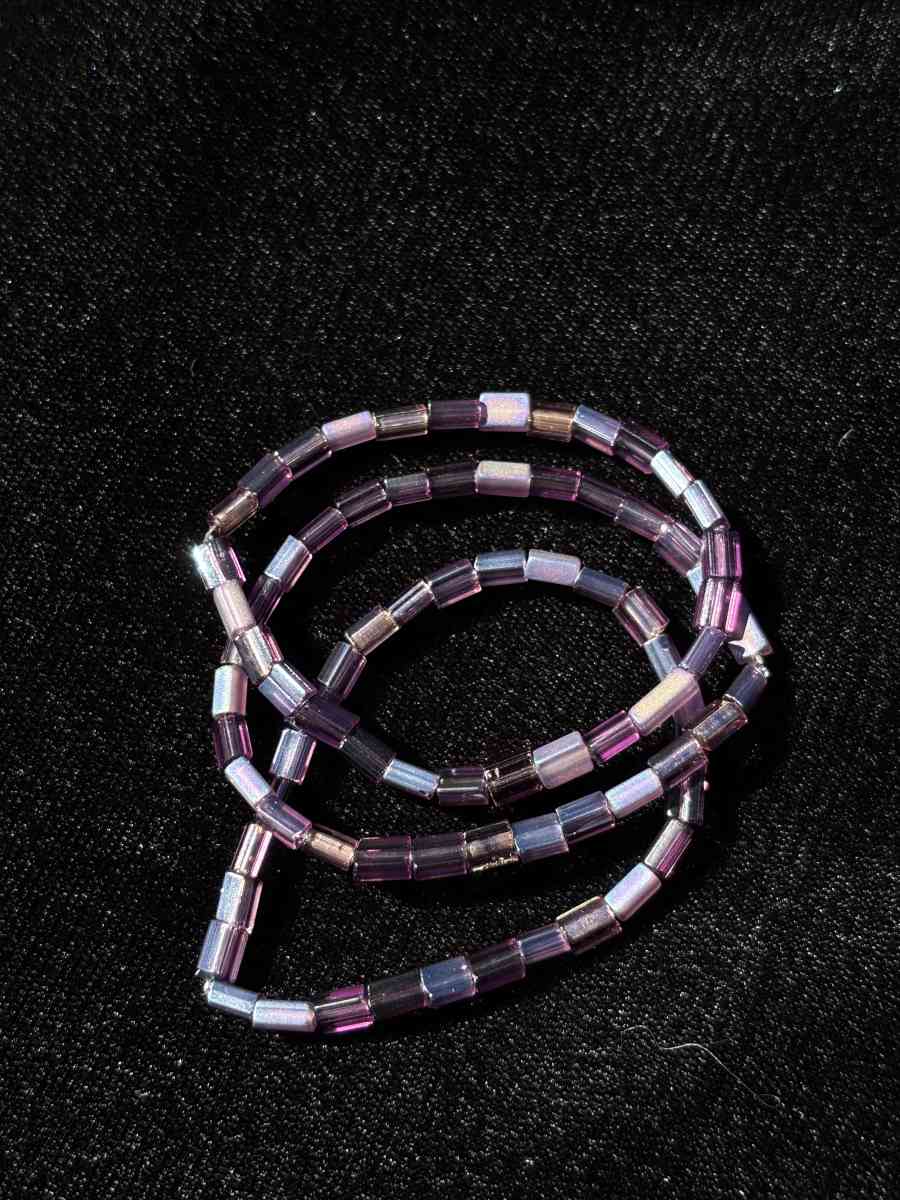 set of 3 handmade elastic purple beaded bracelets