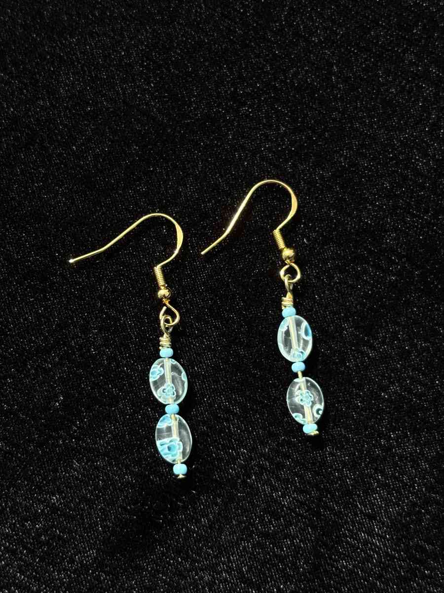 handmade glass blue beaded earrings with little blue flowers