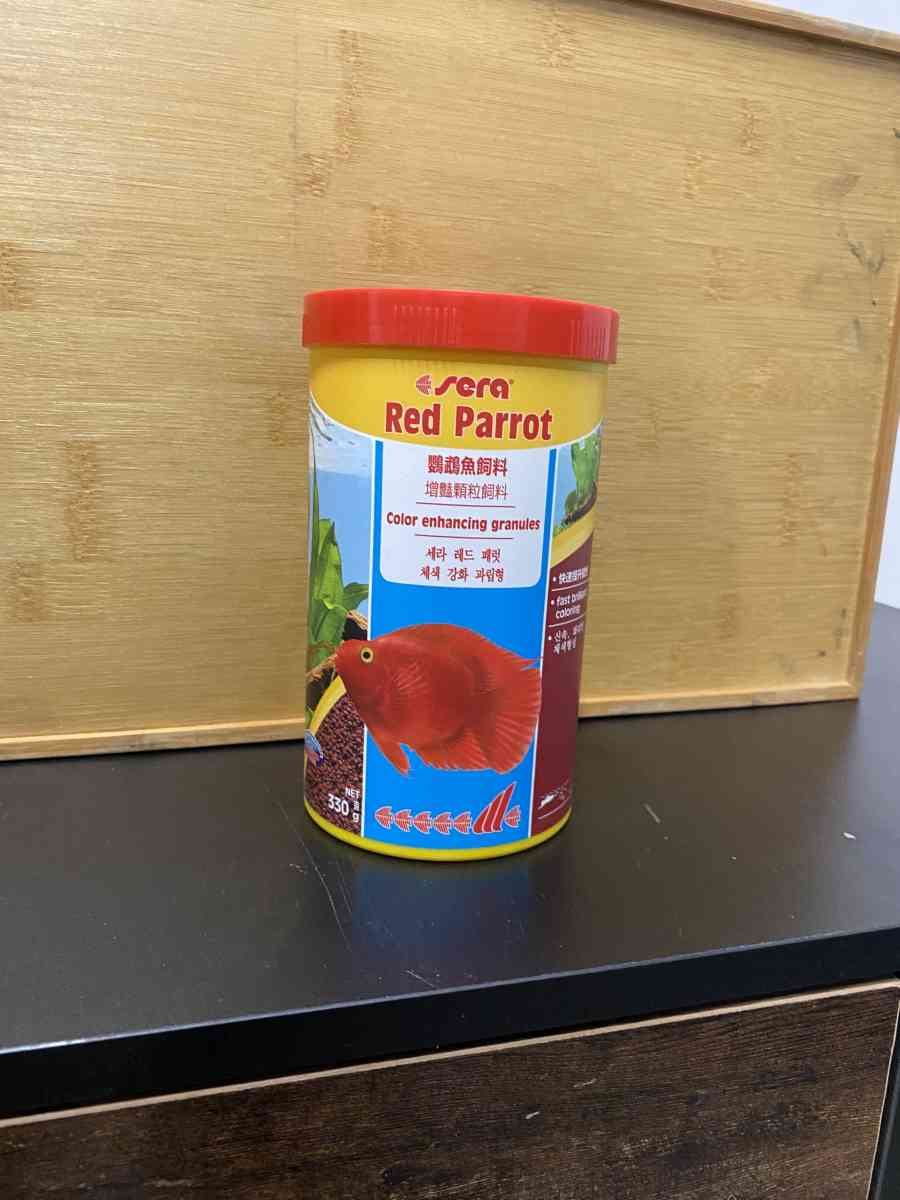 Fish Food to change the color Red Parrot