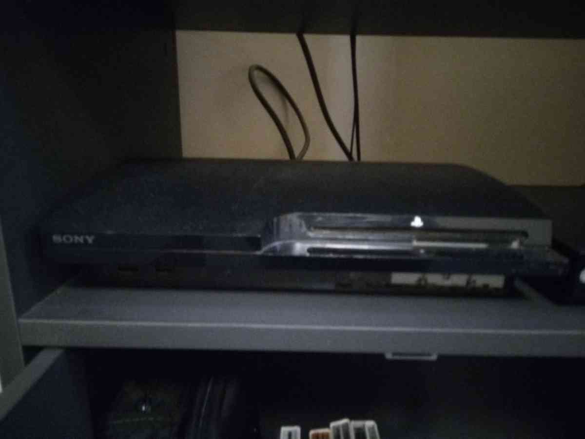 PS3 with controller and headset