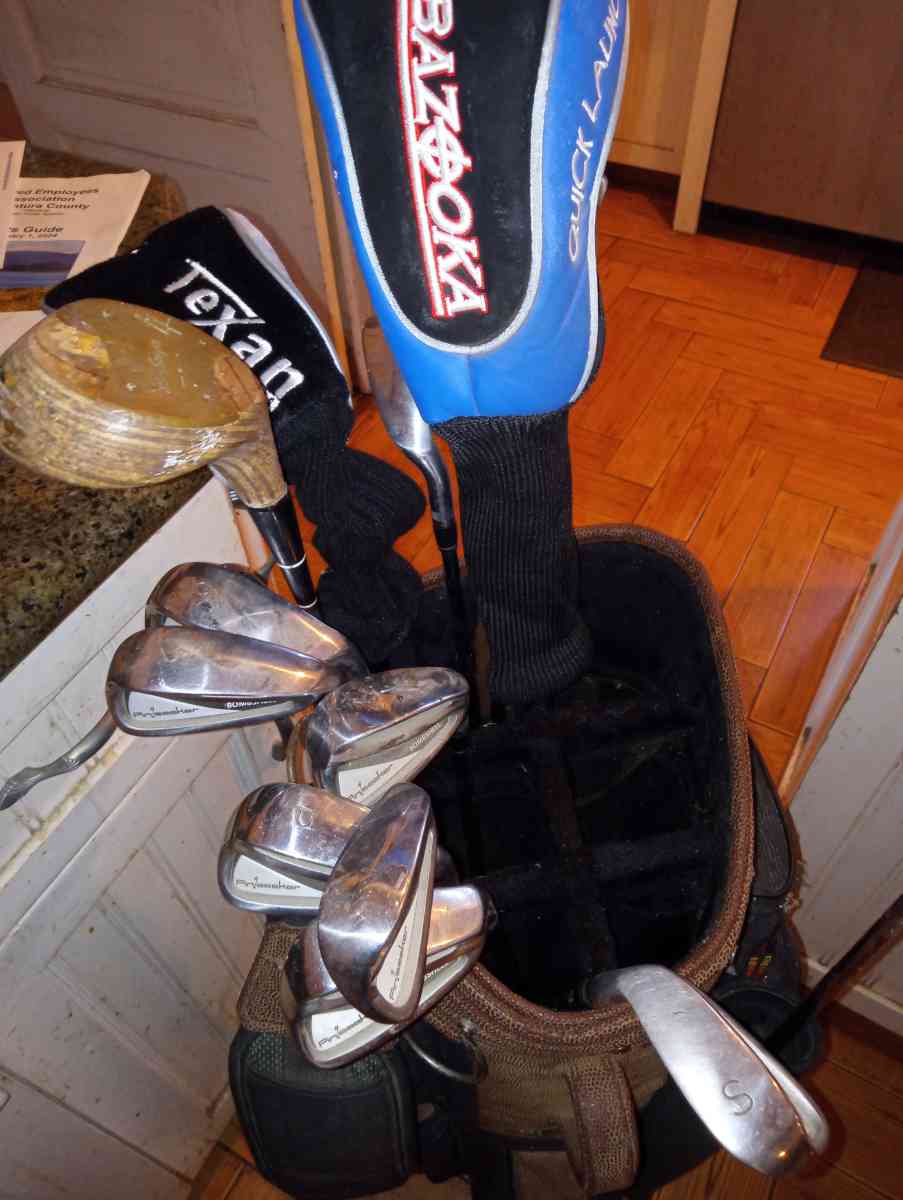 golf bags and clubs