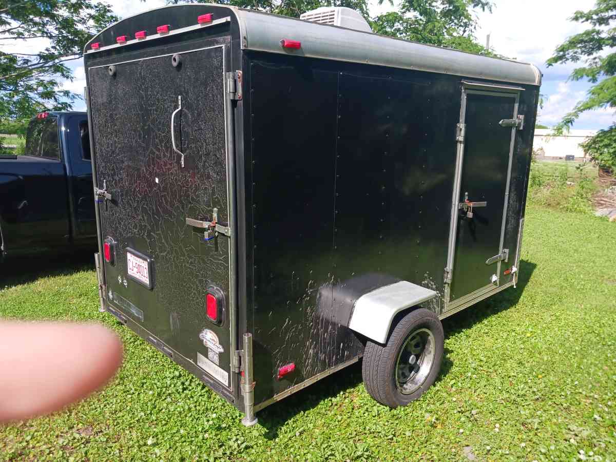 motorcycle trailer with 4 tracks in the floor spare tire