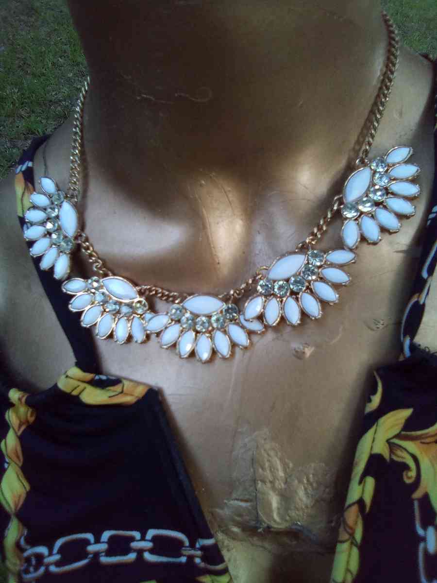 dangling White stoned gold necklace