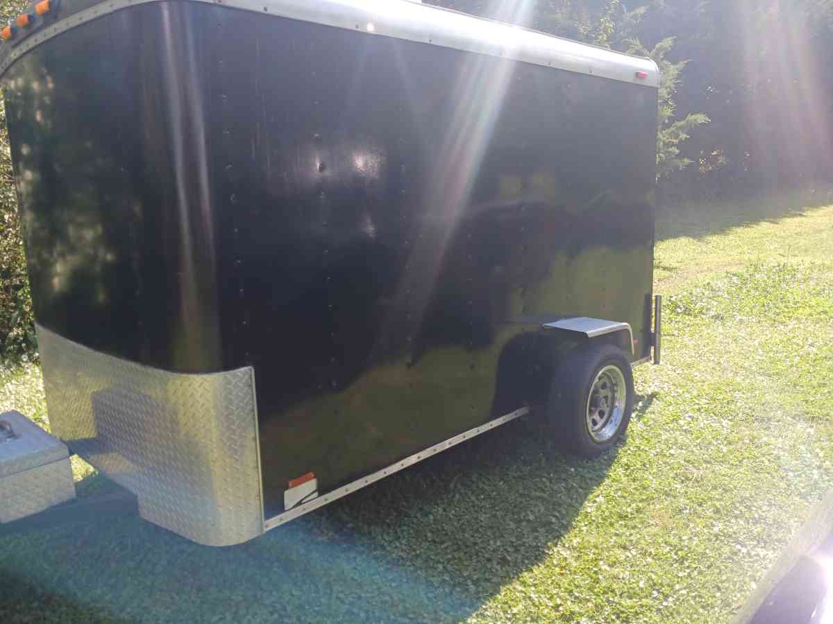 motorcycle trailer with 4 tracks in the floor spare tire