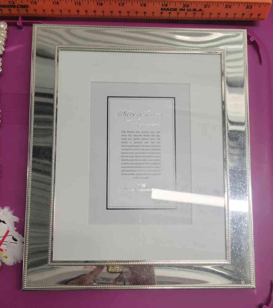 2  8x10 Photo Frames 1 Pearl and Embellished 1 Silver Mirror