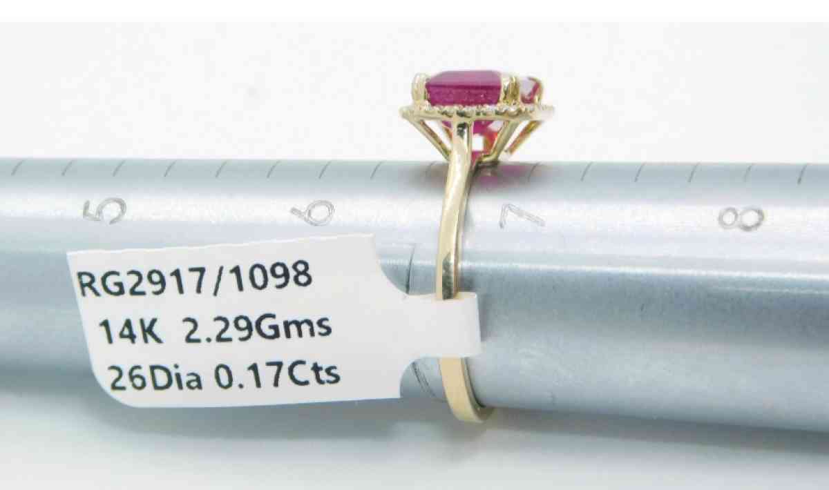 14k Gold Rudy  and diamonds   ring