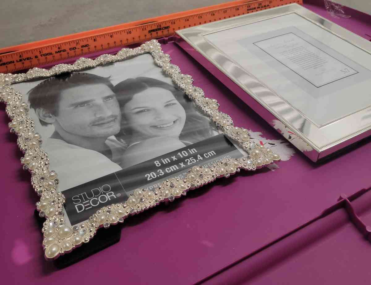 2  8x10 Photo Frames 1 Pearl and Embellished 1 Silver Mirror